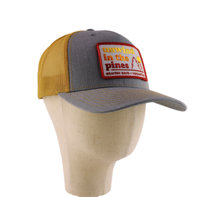 Unwind in the Pines Trucker Hat