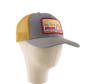 Unwind in the Pines Trucker Hat